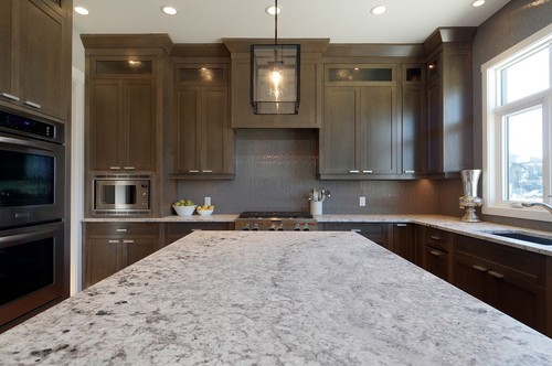Brushed River White Island Top and Countertop with Maple Cabinets, Vertically Laid Glass Pencil Tile
